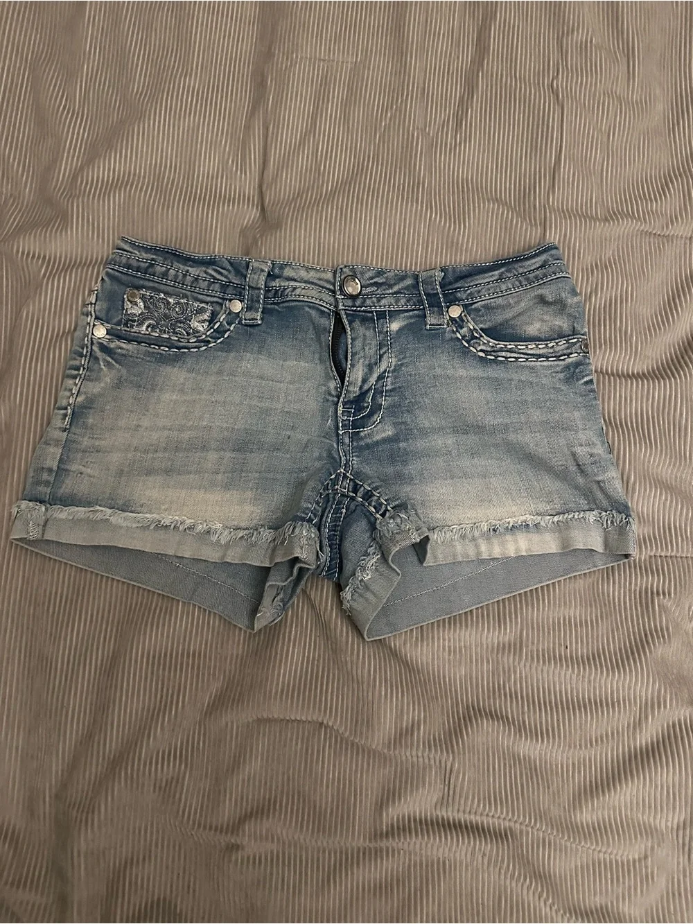 Women’s Light Blue Denim Shorts with Distressed Hem